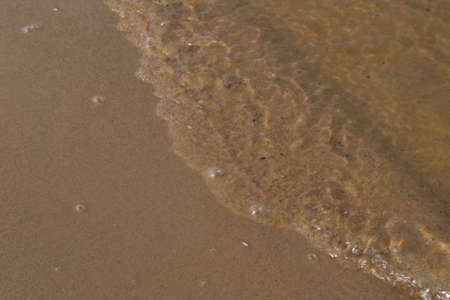 river, small ripples on the water, slow flow.の写真素材