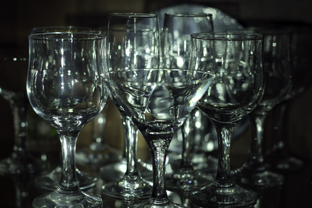 Glasses in the dark sideboardの写真素材