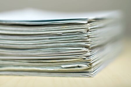 bundles bales of paper documents. stacks packs pile on the desk in the officeの写真素材