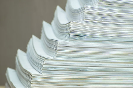 bundles bales of paper documents. stacks packs pile on the desk in the officeの写真素材