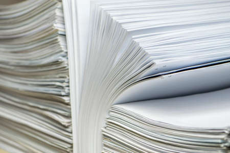 bundles bales of paper documents. stacks packs pile on the desk in the office