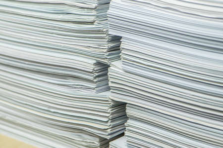 bundles bales of paper documents. stacks packs pile on the desk in the office