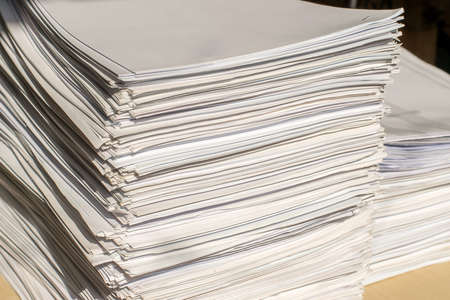 pile of paper documents in the office, paper trash, waste paper