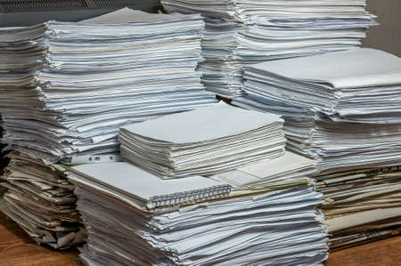 pile of paper documents in the office, paper trash, waste paperの写真素材