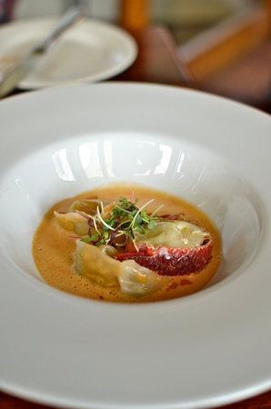 Lobster Medallion with Crab and Prawn Tortellini in Lobster Bisque の写真素材