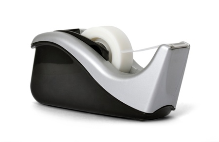 Angled view of sticky tape dispenser on white background の写真素材