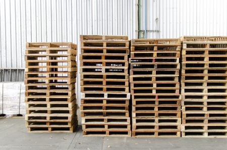 Front view wooden pallets in warehouseの写真素材