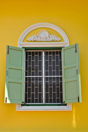 Window of monk's house in Buddhist temple, Thailand の写真素材