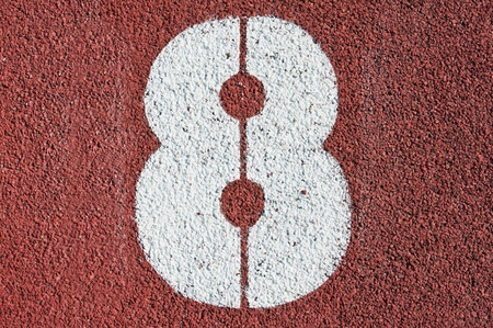 Number eight on the start of a running track - check my portfolio for other numbers の写真素材