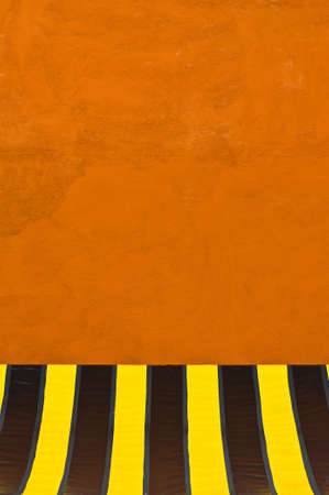 colorful plastic tent at orange wall 