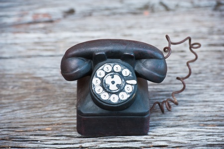 ceramic phone on wood の写真素材