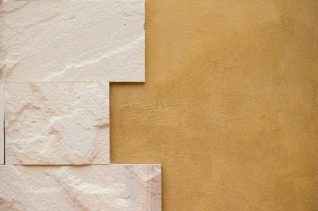 tiled on orange wall の写真素材