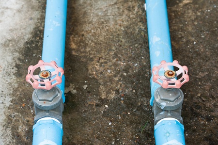 two blue pipes and valves