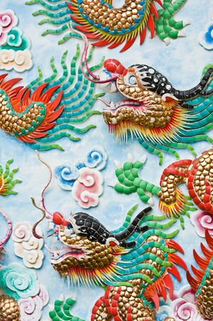 dragon sculpture at chinese temple の写真素材
