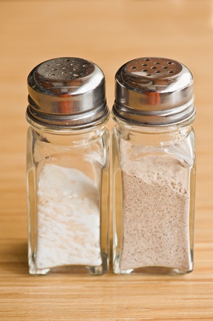 transparent salt and Pepper container wood pattern backgroundの写真素材