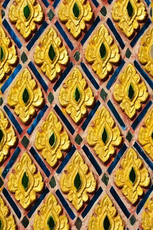 Traditional Thai Style Art Carving at The Door of Temple の写真素材