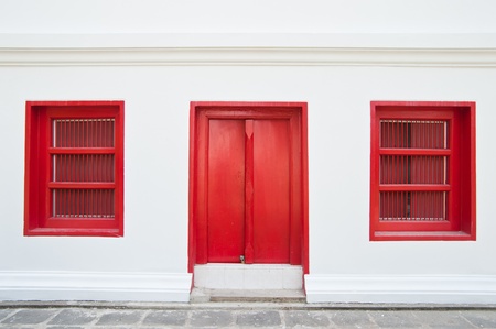 Traditional Thai style red door and window の写真素材