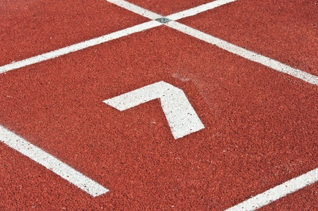 Number seven on the start of a running track - check my portfolio for other numbers