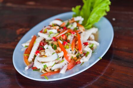 Thai seafood salad in thai restaurantの写真素材
