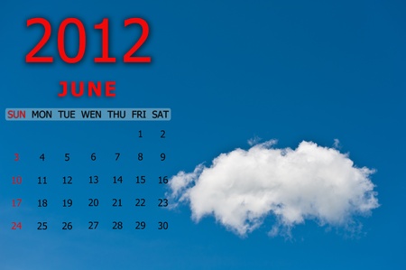 June calender for 2012 with blue sky and cloudの写真素材
