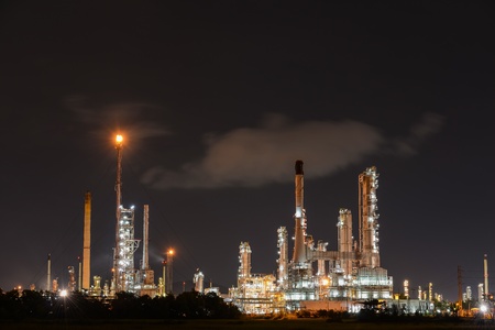 Oil refinery plant at nightの写真素材