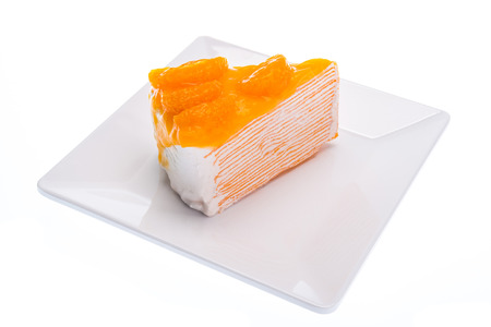 Oranges cake slice, fruit cake on white background.の写真素材