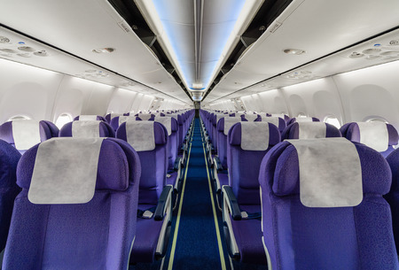 Empty passenger airplane seats in the cabinの写真素材