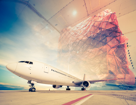 double exposure of air cargo freighter - retro vintage filter effectの写真素材