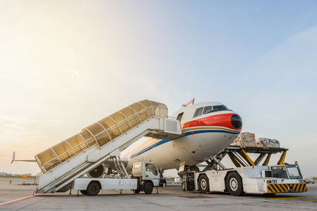 Loading cargo on planeの写真素材