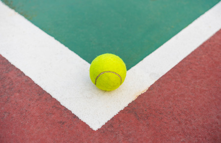 Tennis ball on the courtの写真素材