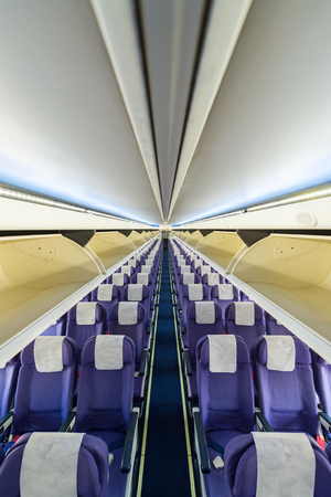 Empty passenger airplane seats in the cabinの写真素材