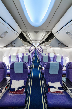 Empty passenger airplane seats in the cabinのeditorial素材