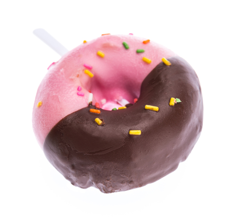 Donut with sprinkles isolated on white backgroundの写真素材