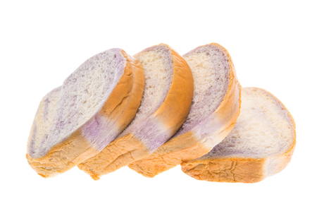 Brown taro bread, sliced bread isolated on white backgroundの写真素材