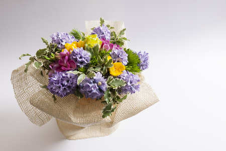 Bouquet of spring flowers coloredの写真素材