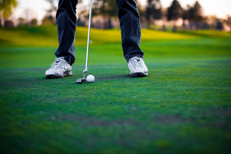 Man playing golf, partial viewの写真素材