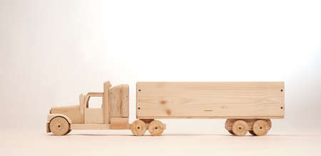 Handmade truck with natural wood. Concept of ecology and nature. Low-emission transport concept.の写真素材