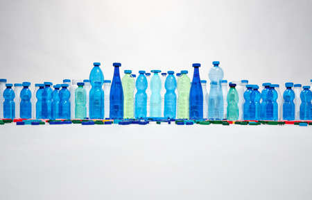 Plastic bottles, plastic caps. Plastic city concept. Plastic free concept.の写真素材