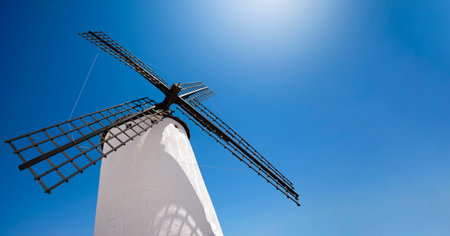 The windmills of Campo de Criptana, located in Castile-La Mancha, on a sunny day in summer. The...