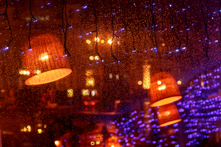 Christmas, New Year, eve holiday blurred window backgroundの写真素材