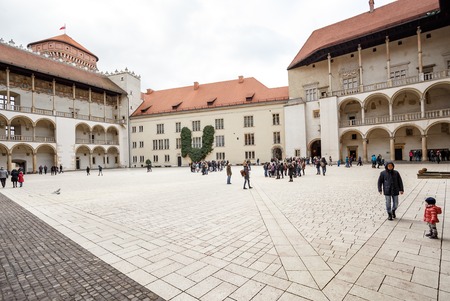 KRAKOW, POLAND, EUROPE - December 28, 2016: Fantastic Krakow. The Gothic Royal Wawel Castle. Compound forms Italian palazzo with open galleries the 16th century Renaissance inner courtyard in Poland.のeditorial素材