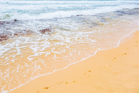 Footsteps on the beachの写真素材