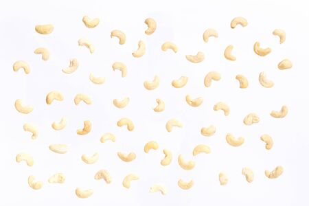 Nuts pattern - cashews on white background. Concepts about decoration, healthy eating and food background.の写真素材