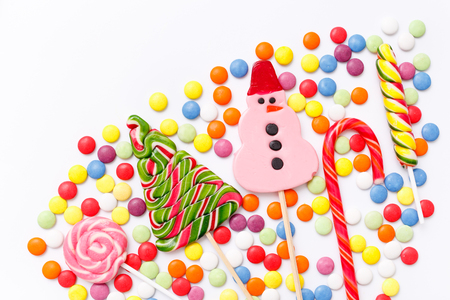 Lollipops sweets. Candy, top view flat lay on white background. Sweet sucker, lollipop, candy, food backgroundの写真素材