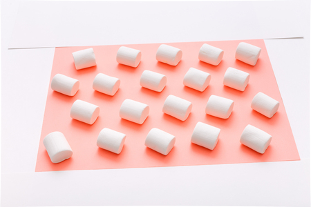 Pattern sweet marshmallow, candy on pink background, top view flat lay. Isolated minimal concept above decoration, view marshmallow, food backgroundの写真素材