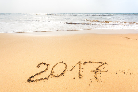 Happy New Year 2017 on the beachの写真素材