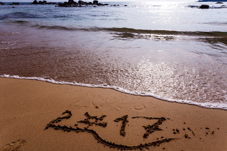 Happy New Year 2017 replace 2016, lettering on the beachの写真素材