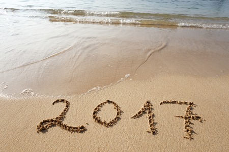 Happy New Year 2017 replace 2016, lettering on the beachの写真素材