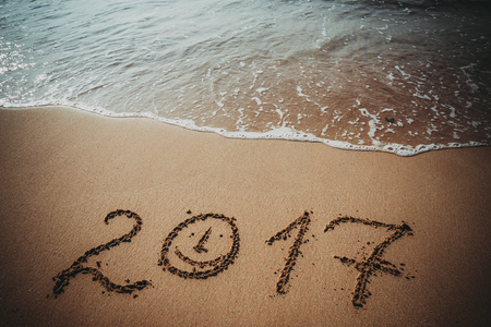 Happy New Year 2017 lettering on the beachの写真素材