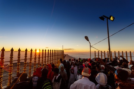 Sri Lanka, Southern Asia - February 14, 2015: Sunrise greeted pilgrims on the holy mount Adams Peak ( also Sri Pada ) is the most popular pilgrim place in Sri Lankaのeditorial素材